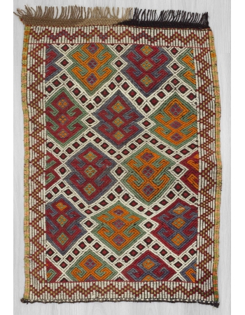 Vintage small embroidered kilim rug